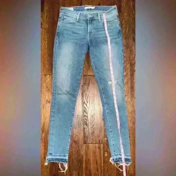 LEVIS Premium 711 Mid Rise Skinny Jean with Raw Hem in Light Wash - Picture 2 of 13